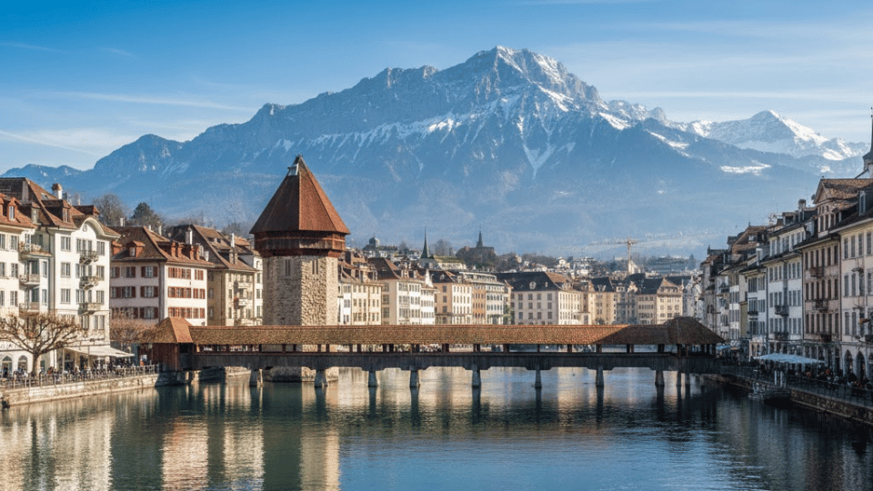 Lucerne old town with Chapel Bridge and Mount Pilatus overlooking Lake Lucerne in Switzerland