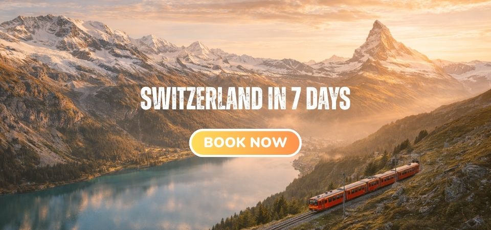 Iconic Switzerland Alps with scenic train, turquoise lake, and dramatic mountain landscape under golden sunrise