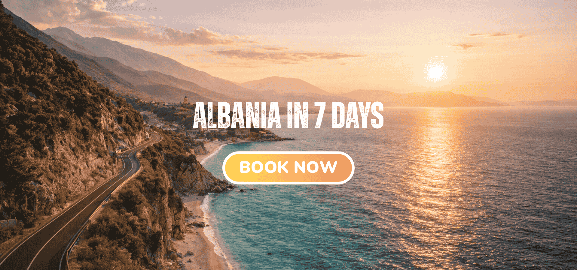 Scenic coastal road along the Albanian Riviera with turquoise Mediterranean waters and dramatic cliffs